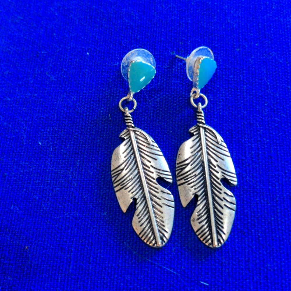 Silver and turquoise earrings with feathers